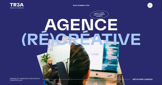 TROA's navy blue website design features white and periwinkle