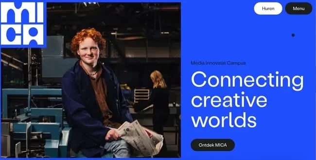 MICA's blue website design features minimal text and large images