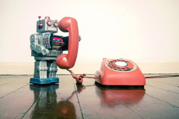robot on the phone to illustrate chatbots for customer service concept