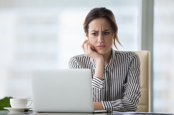 woman writing a communication plan