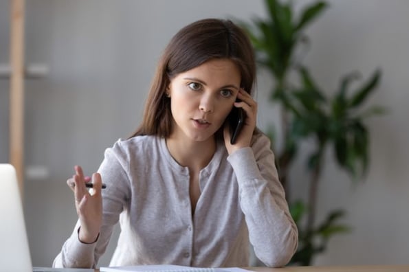 service rep handling a customer complaint over the phone