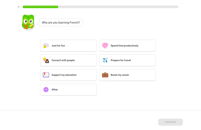Duolingo onboarding screen asking learner's motivation for studying French with personalization options