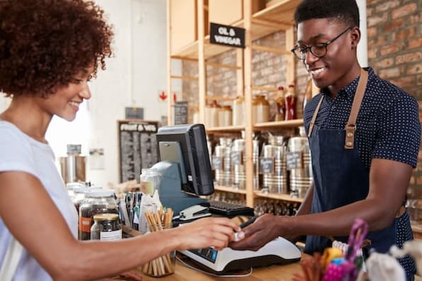 sales associate helps customer who has a high perceived value of their product