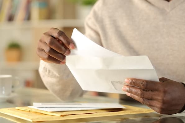 customer opens a piece of direct mail
