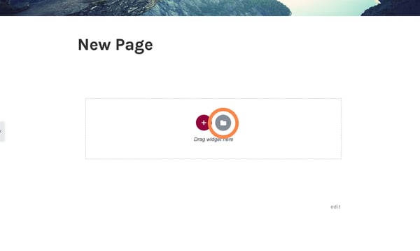 elementor wordpress: How to use Elementor with WordPress  New page inside the Elementor page editor with a box that says "Drag widget here" and a button with a white folder (which should be clicked to reach the template library)