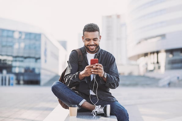 person reading an email with an embedded video