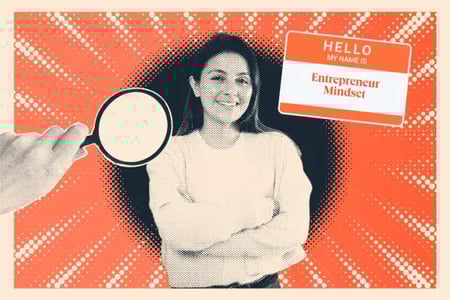 a graphic of a female entrepreneur in the center with a hand holding a magnifying class hovering over her on the left side and a hello my name is entrepreneur mindset on the right side