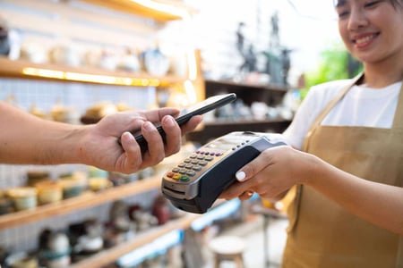 business owner capitalizing on the future of cashless payments