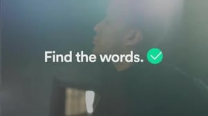 Grammarly programmatic TV ad with a writer in the background and the text "Find the right words"