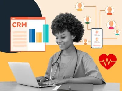 Female doctor using healthcare CRM software on her laptop