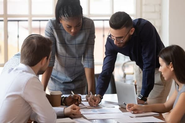 A sales team reviews sales analytics to make decisions about their strategy.