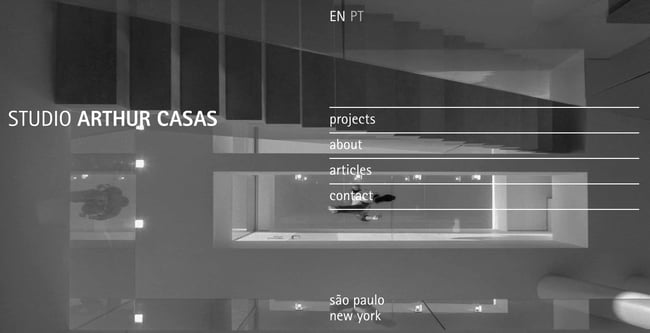 interior design websites: arthur casas shows darkened black and white image of space designed. 