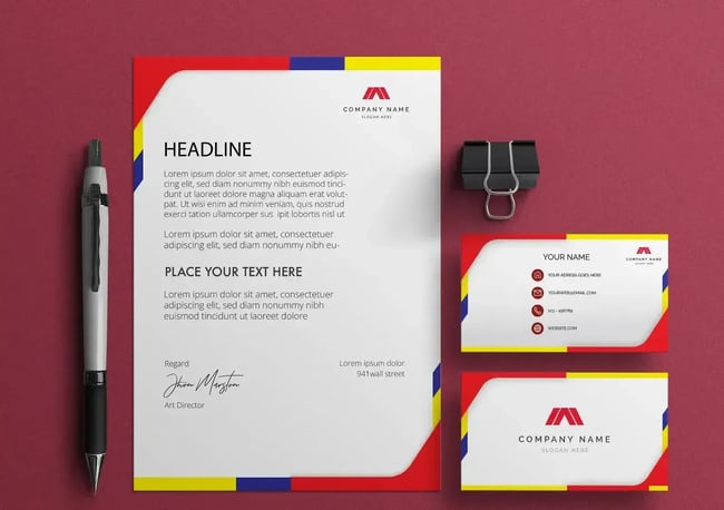 Letterhead with curved page border in red, navy blue, and yellow primary colors framing content