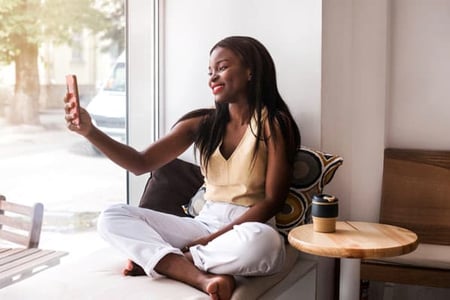 A marketer in the future films herself for LinkedIn Stories.