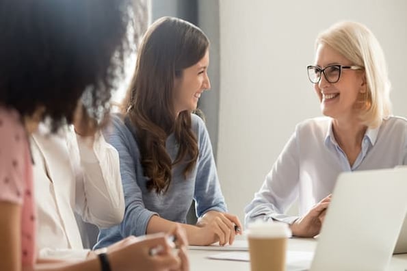 Live Chat Team meets to discuss customer service