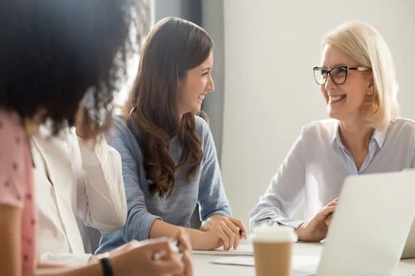 Live Chat Team meets to discuss customer service