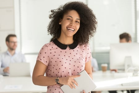 woman deciding how to spend marketing budget during a meeting