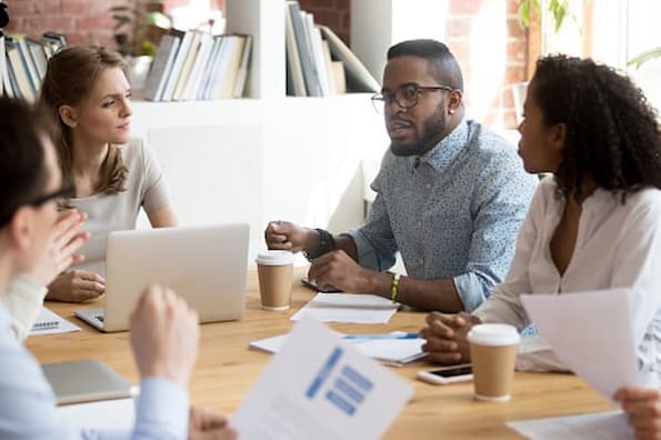 Team meets to discuss upcoming marketing experiment