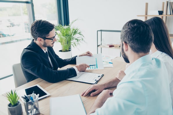 marketing teams working together to manage their business' reputation online