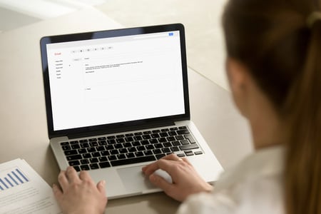 salesperson creating networking email subject lines