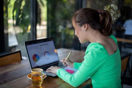 marketer analyzing her brand's share of voice