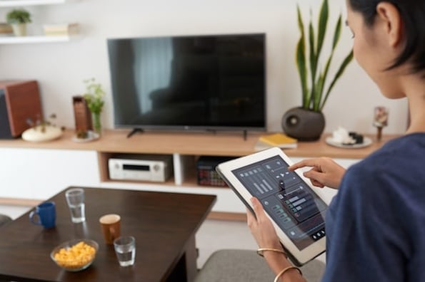 consumer using a smart home device