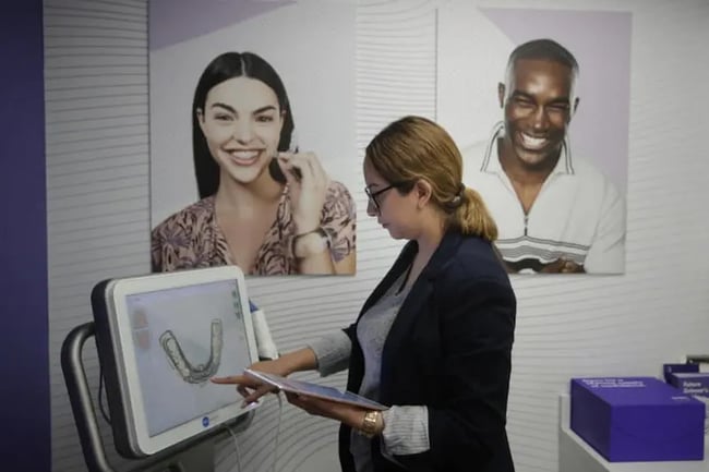 smiledirectclub former employee providing dental service