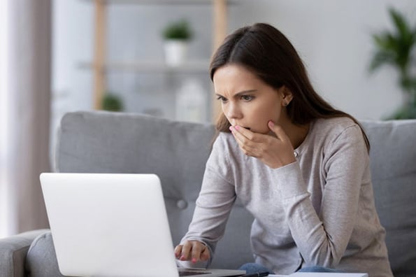 A person looks at a big brand's bad social media fail.