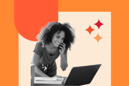 videographer theme wordpress: image shows a person on the phone with a laptop discussing theme options 
