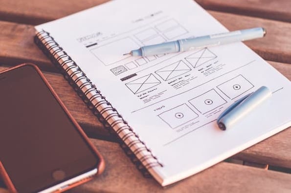 website wireframe in a notebook