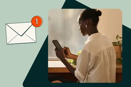 welcome email examples, woman looking at email on phone