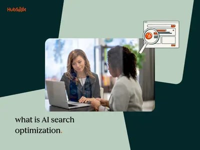 Two women at laptop researching what is AI search optimization