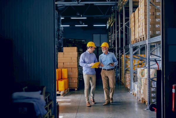 salesperson conducting an industrial sale