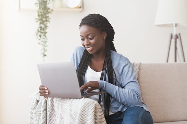 Marketer adding a widget to her website