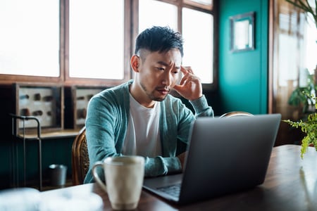 person using laptop to prepare their wordpress website for a high traffic event