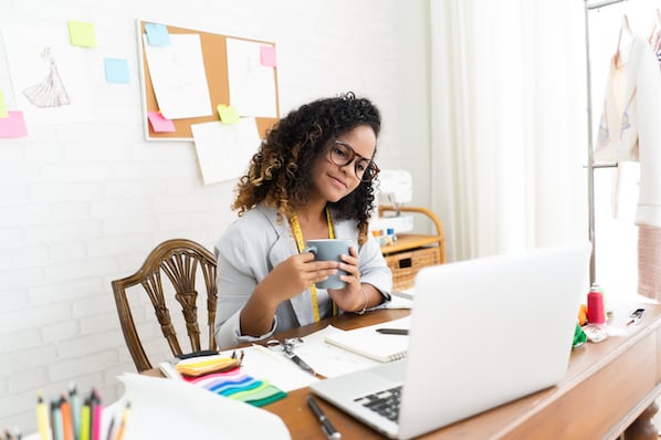 Business owner evaluating godaddy alternatives for web hosting