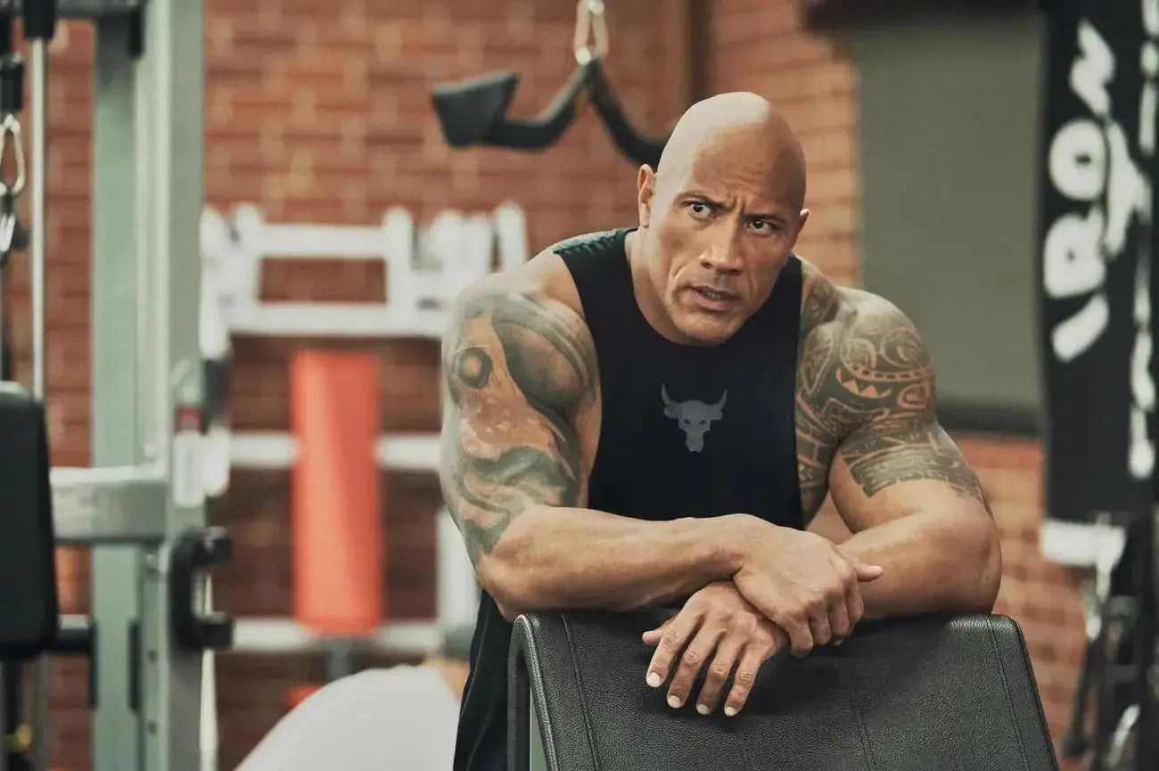 Dwayne The Rock Johnson taking a break at the gym.