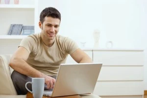 person on laptop researching the anatomy of a webpage