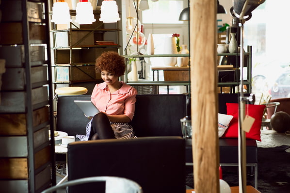 Person looking at the best startup websites to inspire their own.
