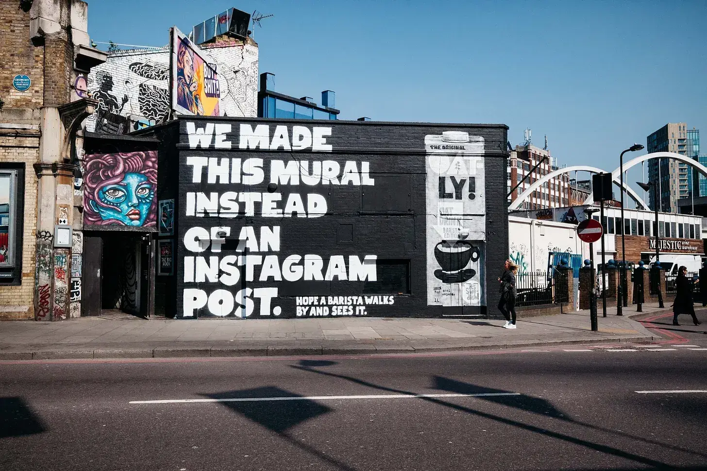 Oatly street mural advertisement showcasing distinctive brand personality through messaging