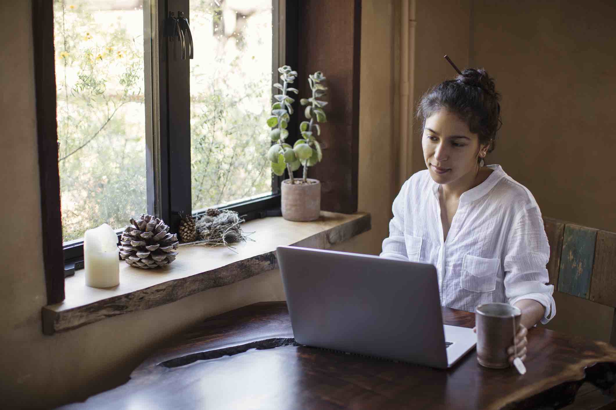 person reads customer retention email on laptop