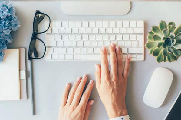 A person prepares to write a blog post after crushing writers block.