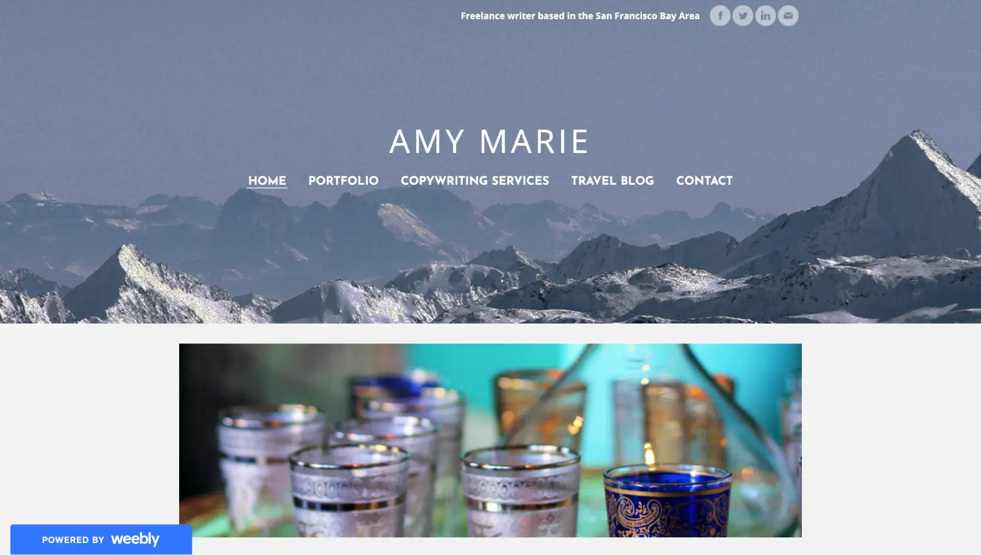 my old small business website that i built for free using weebly. it has a powered by weebly label in the bottom left corner.