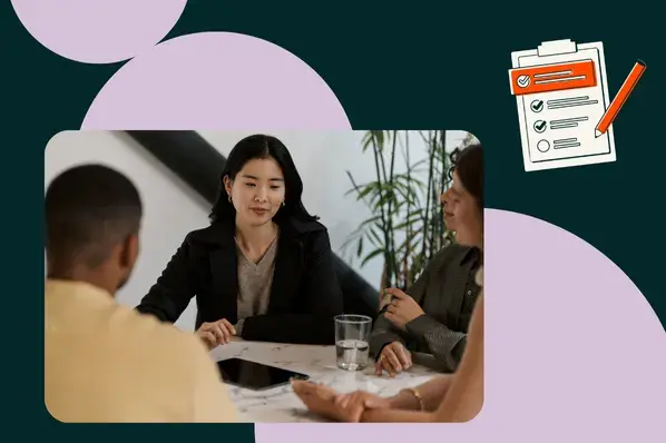 marketing manager reviewing objectives vs goals with her team