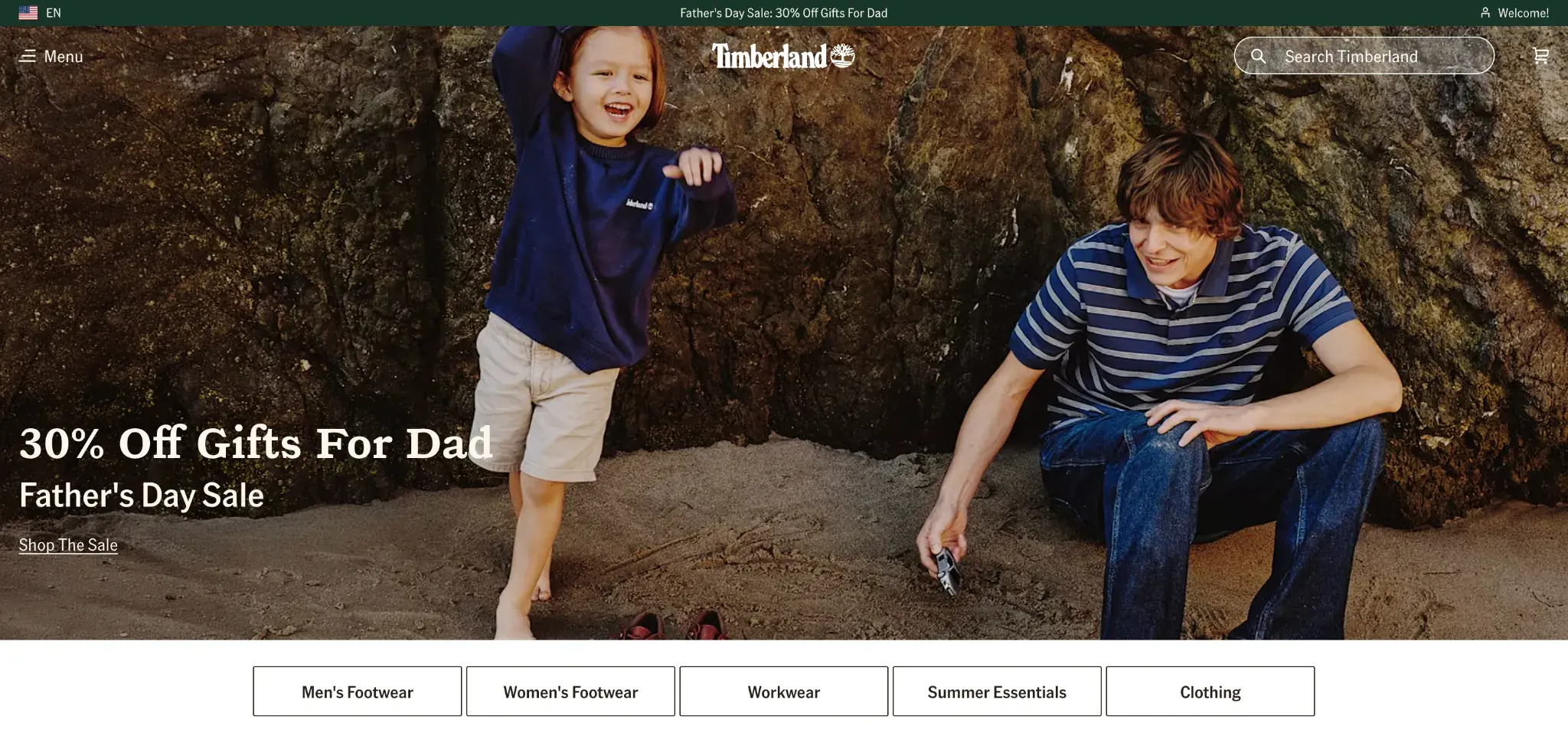 Timberland Father’s Day sale homepage showing adult and child outdoors with 30% off gifts promotion and product category buttons