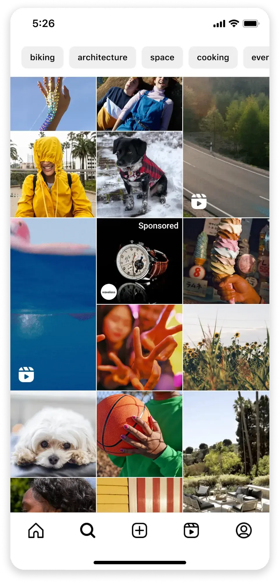 screenshot of tiles on an instagram explore page, with a sponsored tile in the center.