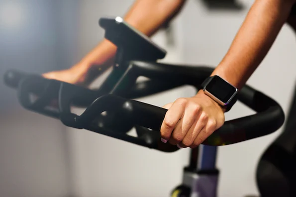 person on stationary bike