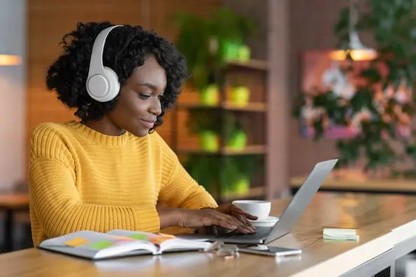 woman on laptop verifying facebook page