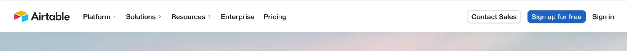 main website navigation bar example from airtable