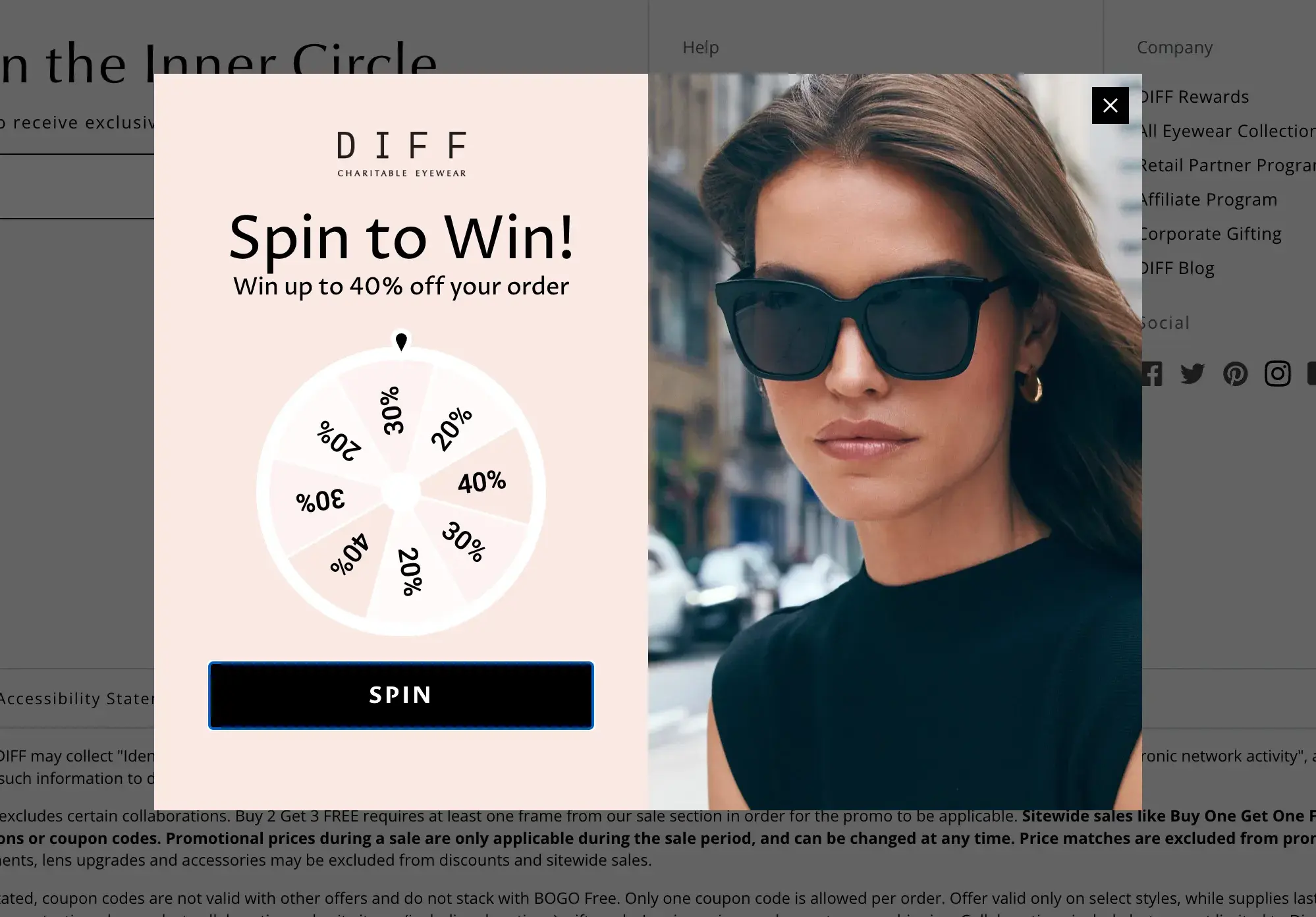 website pop-up examples: spin-to-win pop-up with discounts offered on a spinning wheel